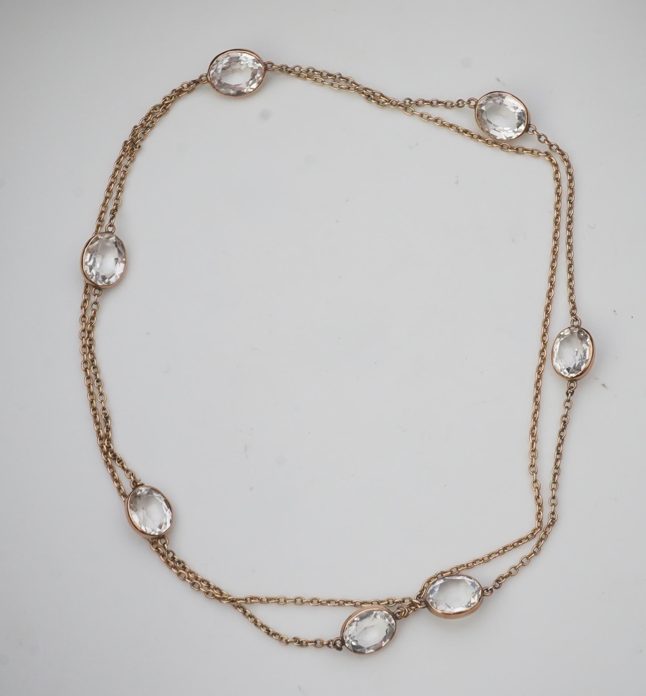 A rock crystal long chain necklace, early 20th century